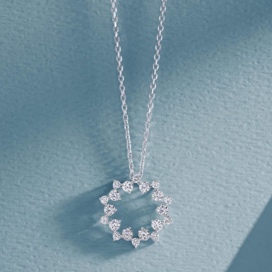 pexels-the-glorious-studio-3584518-10983780 Designer round pendant in silver with precious stones